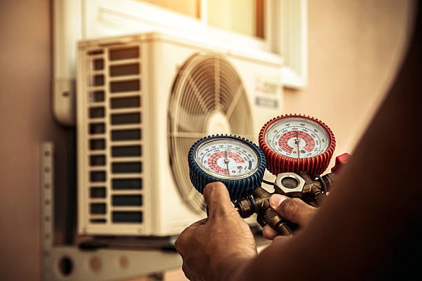 Professional Heat Pump Repair technician working in Wills Point, TX